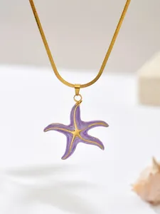 Close-up of a purple enamel starfish pendant on a gold-plated steel snake chain.