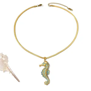 Elegant gold plated stainless steel seahorse pendant necklace with blue ocean style detail