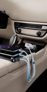 Macro detail of a blue braided 3-in-one fast charging cable used in a car console