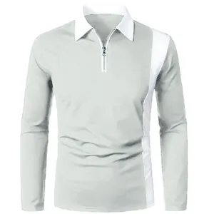 Men's grey and white colorblock long-sleeve polo shirt with quarter-zip neck detail.