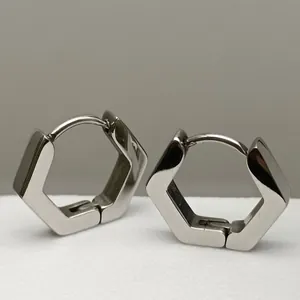 Polished silver hexagonal titanium steel hoop earrings for a modern minimalist style