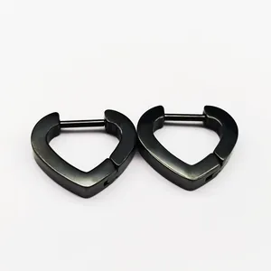 Close-up view of black titanium steel heart-shaped huggie hoop earrings on white background