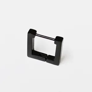 Close-up detail view of a minimalist matte black titanium steel square hoop earring