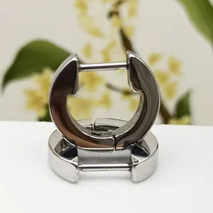 Pair of minimalist silver titanium steel geometric hoop earrings for men and women