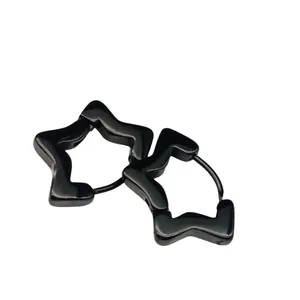 Detailed close-up view of a pair of black star-shaped hoop earrings in glossy finish