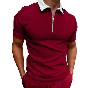 Close-up of men's burgundy polo shirt with white collar and front zipper detail