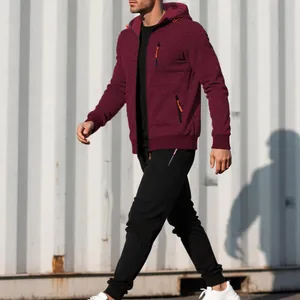 Men's sports tracksuit featuring a maroon jacquard hooded jacket and black joggers