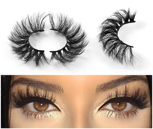 Detailed macro view of thick D-curl fluffy false eyelashes and dramatic wear effect