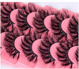 Detailed view of dense D-curl messy style false eyelashes in a 7-pair set.