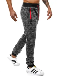 Pantalon de jogging gris chiné pour homme avec une poche zippée rouge contrastante