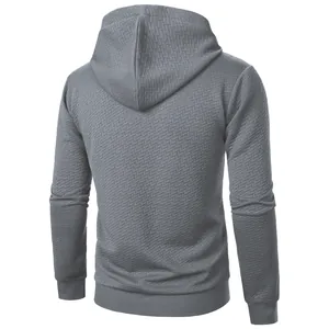 Back view of gray jacquard men's hoodie showing textured fabric detail
