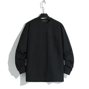 Classic black men's crewneck cable knit sweater with textured jacquard pattern