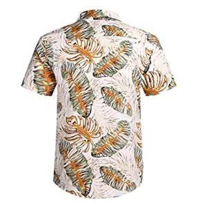 Back view of a white Hawaiian shirt with tropical orange and green leaf print.