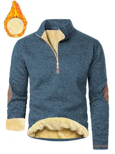 Detailed macro shot of men's blue thick fleece-lined quarter-zip pullover sweatshirt