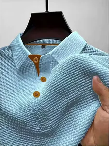 Detailed view of light blue mesh ice silk polo shirt showing breathable waffle texture