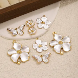 Vintage stainless steel flower and butterfly pendants with white shell texture for jewelry