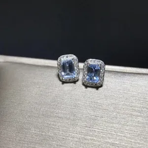 Elegant S925 silver-plated halo stud earrings with light blue emerald-cut stones