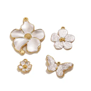 Vintage stainless steel flower and butterfly charms with mother of pearl texture