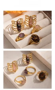 Close-up of vintage titanium steel rings with wire-wrapped details and crushed stones