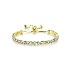Close-up of elegant gold tennis bracelet featuring brilliant round-cut cubic zirconia