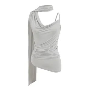 Detail view of a grey asymmetrical halter neck top featuring elegant draped fabric