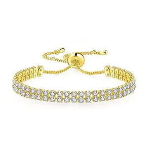 Close-up view of a double-strand gold-tone zircon bracelet with an adjustable bolo clasp