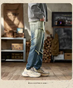 Detailed side profile of men's American vintage distressed blue loose harem denim jeans