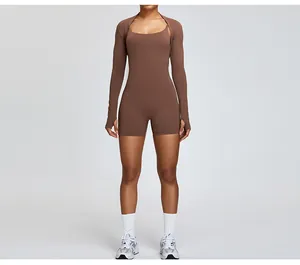 Front view of a brown long sleeve sports shrug with thumb holes for fitness training