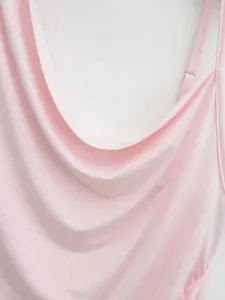 Close-up of the pink draped cowl neckline on a silky camisole tank top garment.