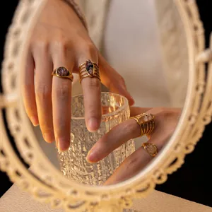 Vintage gold wire wrapped titanium steel ring with inlaid zircon gemstones for women.