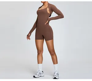 Close-up detail view of a brown long sleeve activewear shrug for women in studio