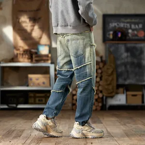 Vintage washed loose harem jeans for men with unique distressed fringe seam detailing