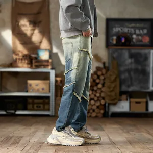 American vintage washed loose fit men's denim jeans with distressed patched design