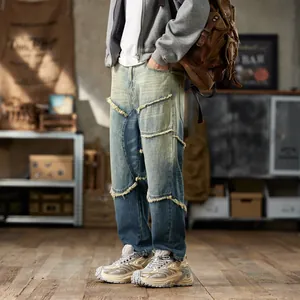 American vintage style loose washed patchwork denim harem pants with frayed edges for men