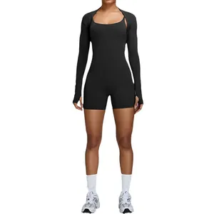 Women's black seamless one-piece sports bodysuit with matching long sleeve shrug set