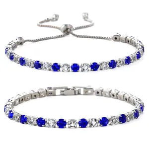 Elegante zilverkleurige tennisarmband met afwisselend blauwe en heldere zirkonia's