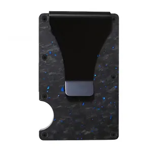 Minimalist carbon fiber RFID blocking card holder with money clip and blue flakes.