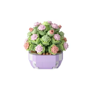 Artificial rose and succulent flower building block set in a stylish purple pot