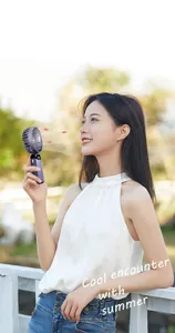 Portable mini handheld fan with digital display and USB rechargeable design for cooling