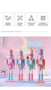 Detail view of four pastel macaron Nutcracker ornaments with candy-themed designs