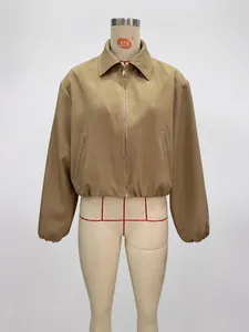 Detailed view of a stylish khaki women's zip-up jacket with a puff hem on a mannequin