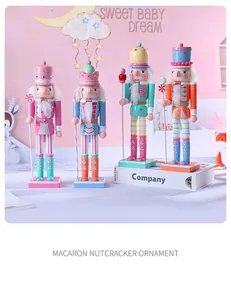 Set of four pastel macaron nutcracker wooden ornaments shown in a nursery room decor