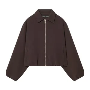 Detailed front view of a dark brown zip-up jacket with classic collar and elastic hem.