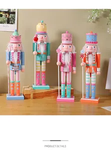 Close-up of candy macaron colored wooden nutcracker ornaments for Christmas decor