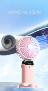 Pink handheld portable fan with digital display showing battery level against sky background