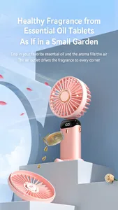 Detail of pink portable fan with essential oil diffuser feature and digital display