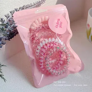 Set of high elasticity gradient pink telephone wire hair ties in cute gift packaging