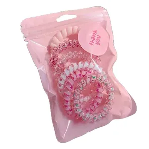 High-elasticity gradient pink phone cord hair ties set in pink gift packaging.