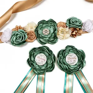 Elegant sage green floral maternity sash set with Mommy and Daddy to Be corsage pins