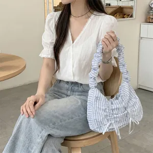 Korean style blue and white striped pleated handbag with cute white bow detail for women